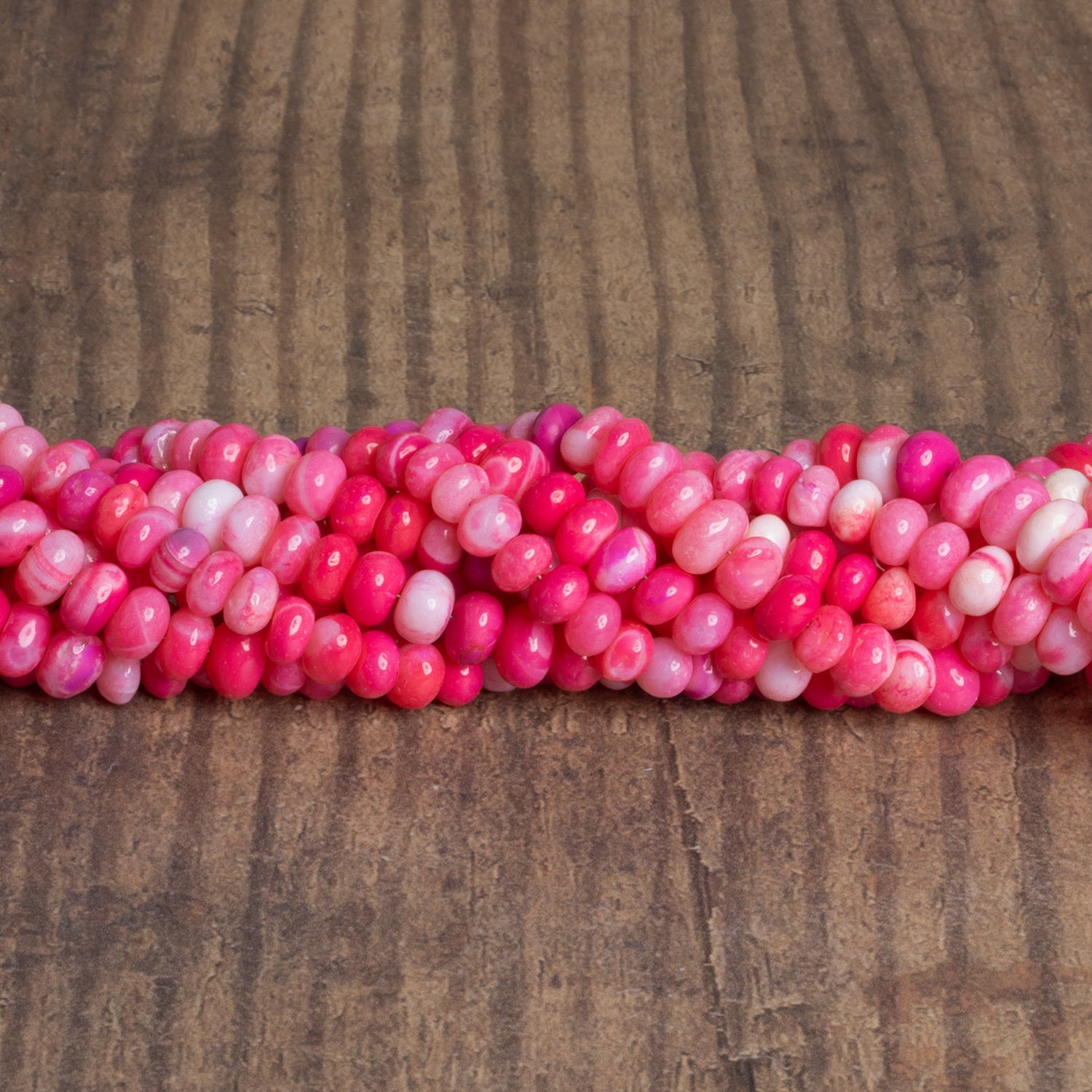 7mm Hot Pink Opal Plain Rondelles 16 inch 85 beads - The Bead Traders