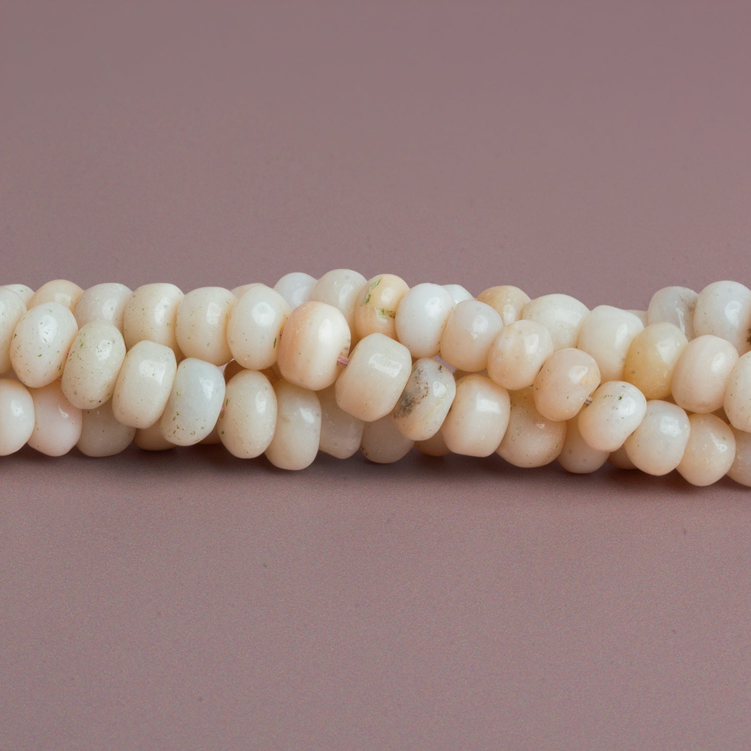 7mm Pink Peruvian Opal Plain Rondelles 15 inch 85 beads - The Bead Traders
