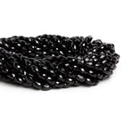 7x5mm Black Onyx Faceted Tubes 15 inch 55 beads - The Bead Traders