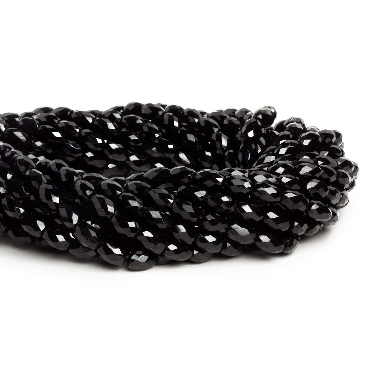 7x5mm Black Onyx Faceted Tubes 15 inch 55 beads - The Bead Traders