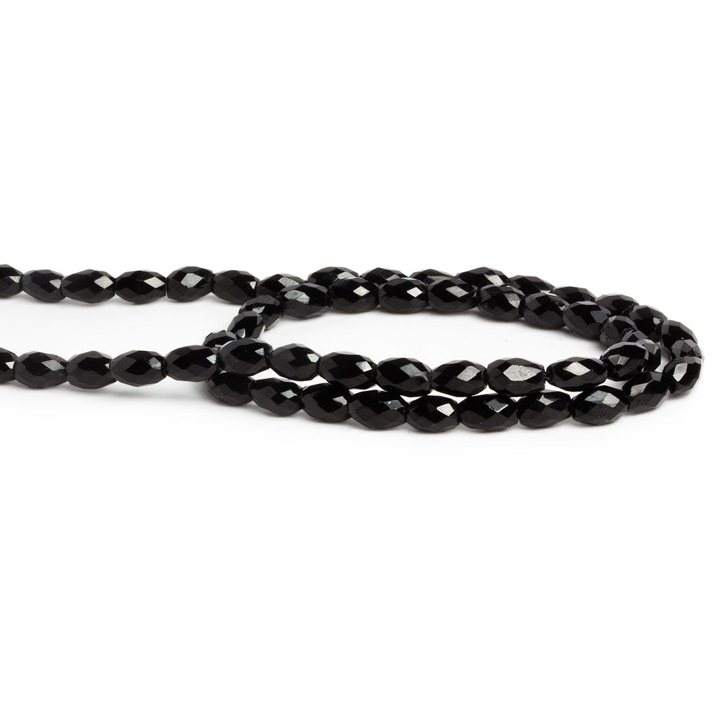 7x5mm Black Onyx Faceted Tubes 15 inch 55 beads - The Bead Traders