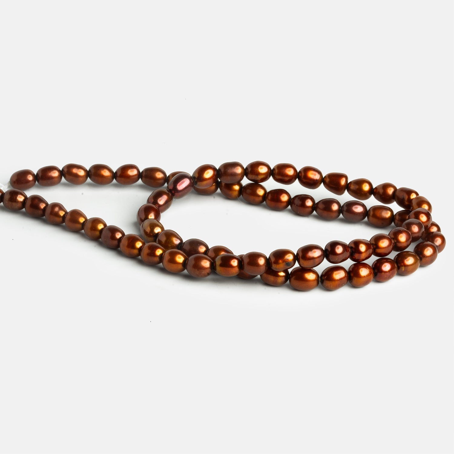 7x5mm Copper Straight Drilled Oval Pearls 15 inch 51 beads - The Bead Traders