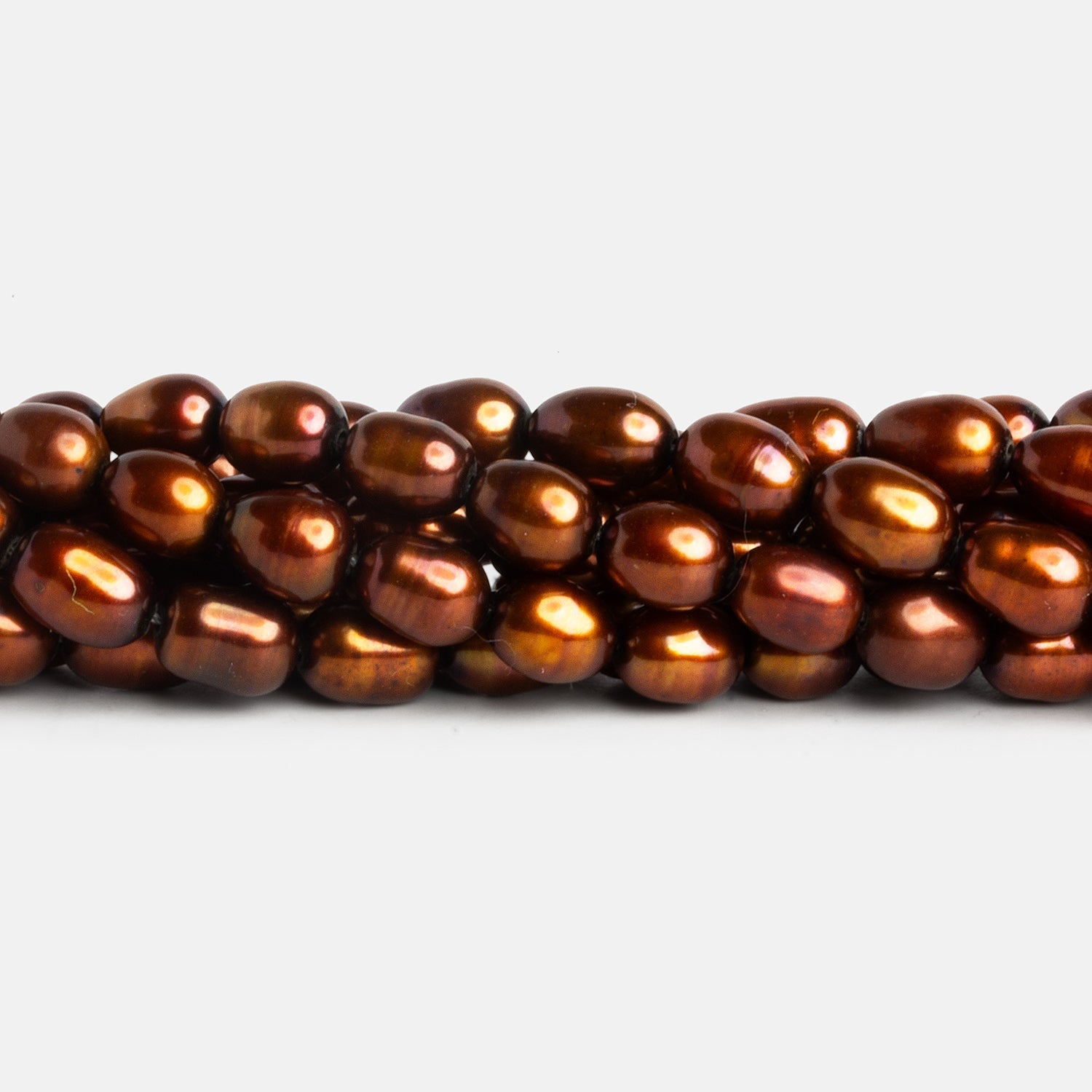 7x5mm Copper Straight Drilled Oval Pearls 15 inch 51 beads - The Bead Traders