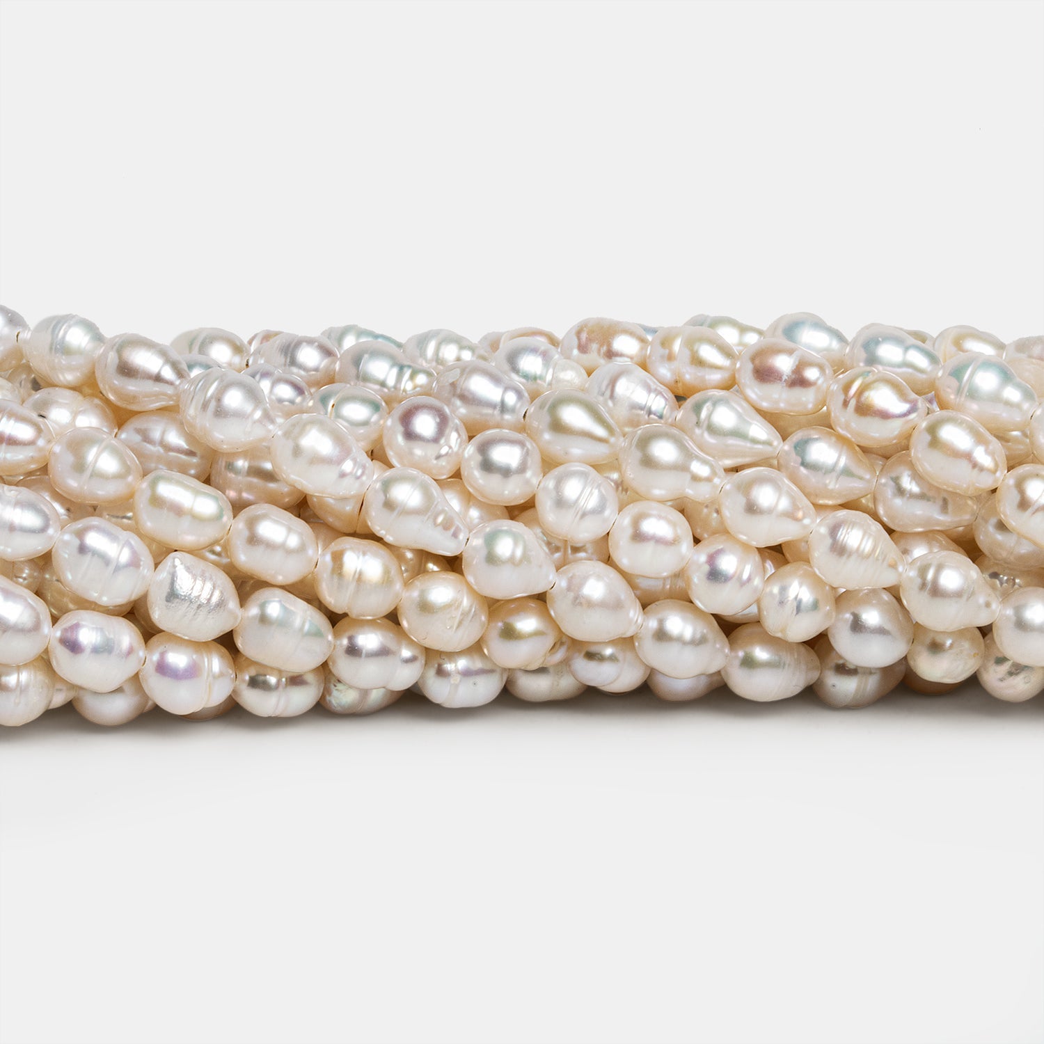 7x5mm Cream Petite Baroque Pearls 15 inch 53 beads - The Bead Traders