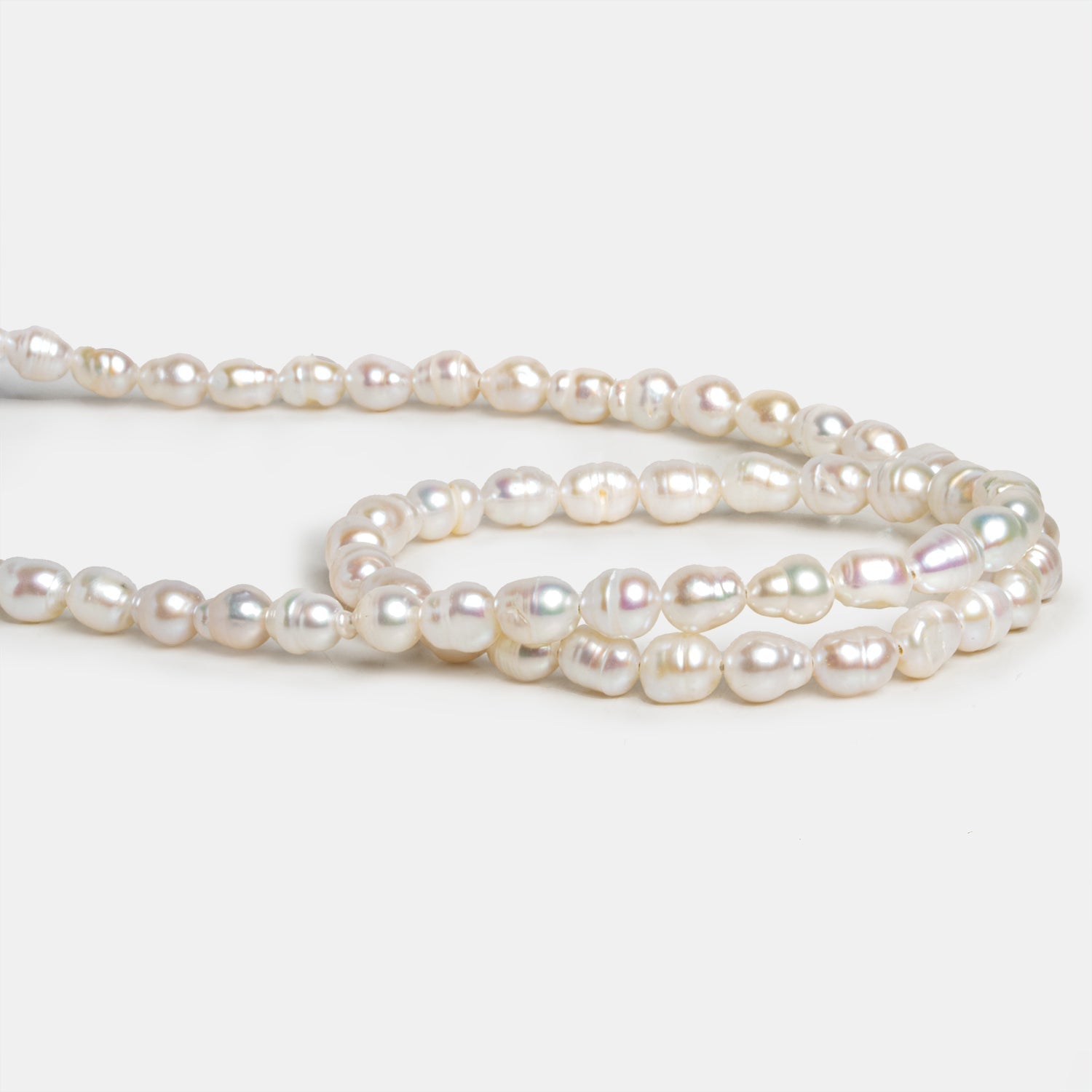 7x5mm Cream Petite Baroque Pearls 15 inch 53 beads - The Bead Traders
