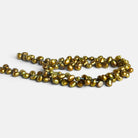 7x5mm Green Oval Pearls 16 inch 100 beads - The Bead Traders