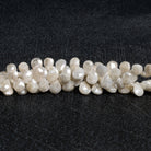 7x5mm Mystic Sapphire Faceted Pears 8 inch 55 beads - The Bead Traders