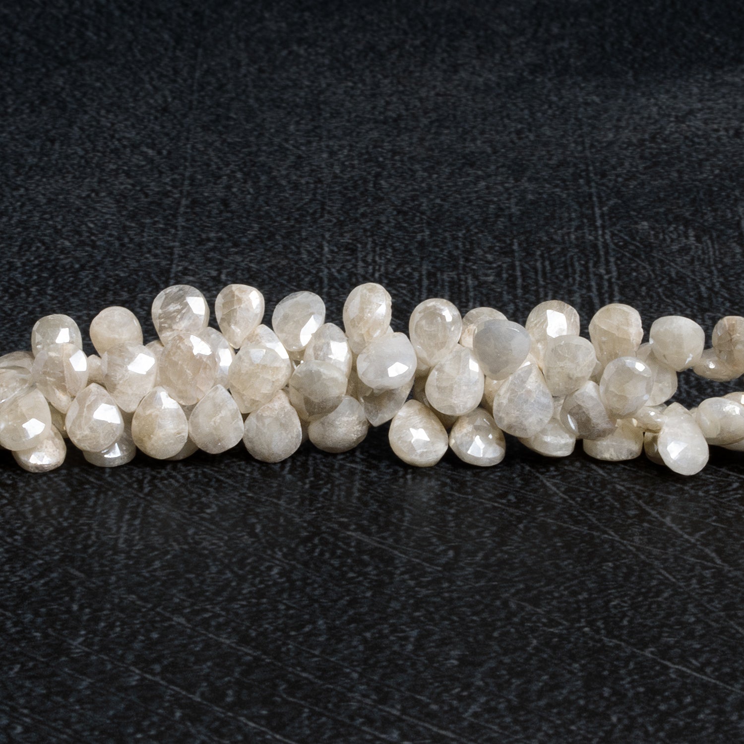 7x5mm Mystic Sapphire Faceted Pears 8 inch 55 beads - The Bead Traders