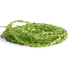 7x5mm Peridot Plain Ovals 15 inch 72 beads - The Bead Traders