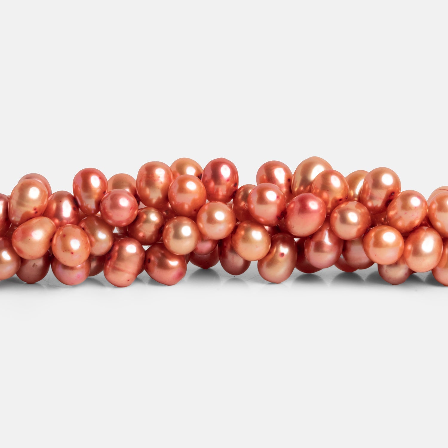 7x5mm Salmon Baroque Pearls 15 inch 75 beads - The Bead Traders