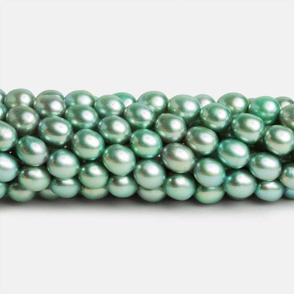 7x6mm Mint Oval Pearls 15 inch 55 beads