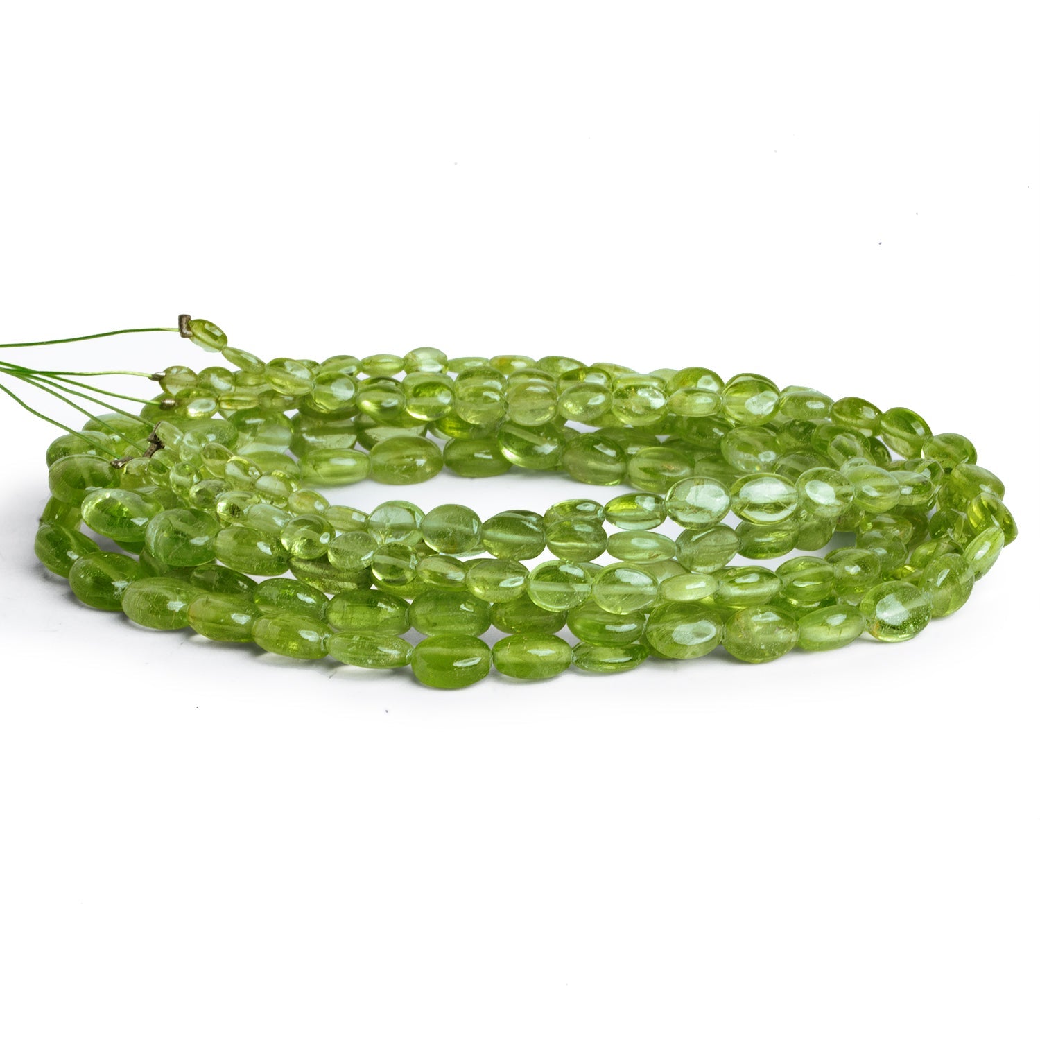 7x6mm Peridot Plain Ovals 15 inch 62 beads - The Bead Traders