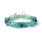 8 - 10mm Neon Teal Fluorite Faceted Candy Kisses 7.5 inch 43 beads - The Bead Traders
