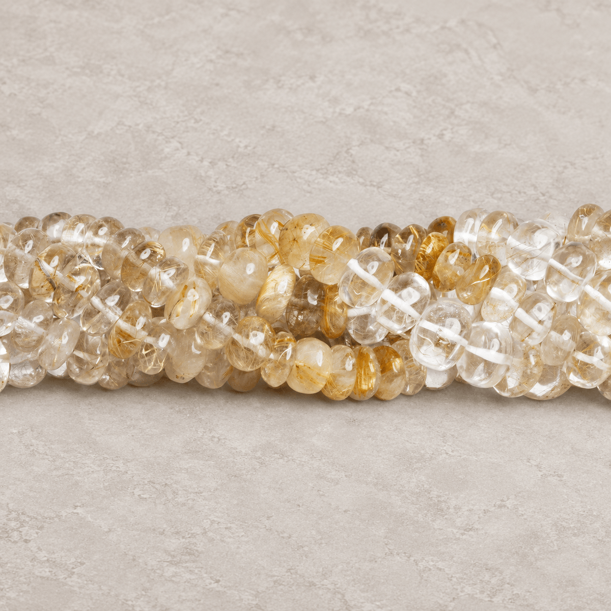 8-12mm Rutilated Quartz Plain Rondelles 16 inch 68 beads - The Bead Traders