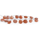 8 - 15mm Reddish Peach Moonstone Plain Hearts 10 inch 18 beads - The Bead Traders