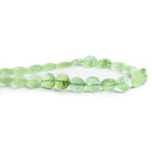 8 - 9mm Prehnite Faceted Coins 8 inch 21 beads - The Bead Traders