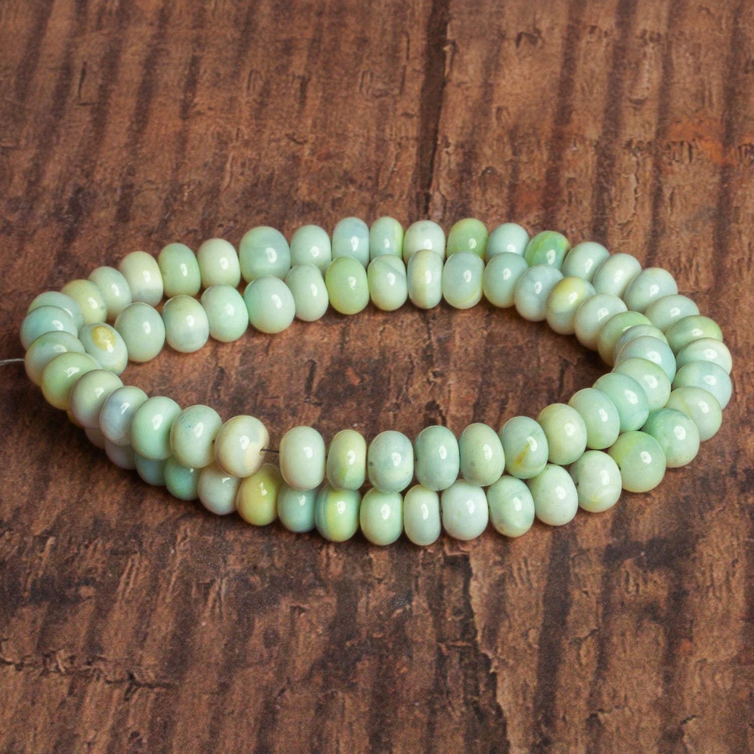 8 - 9mm Yellow Green Plain Rondelles 16 inch 67 beads - The Bead Traders