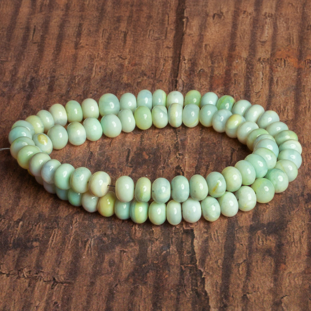 8 - 9mm Yellow Green Plain Rondelles 16 inch 67 beads - The Bead Traders