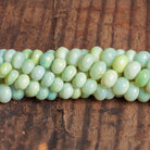 8 - 9mm Yellow Green Plain Rondelles 16 inch 67 beads - The Bead Traders