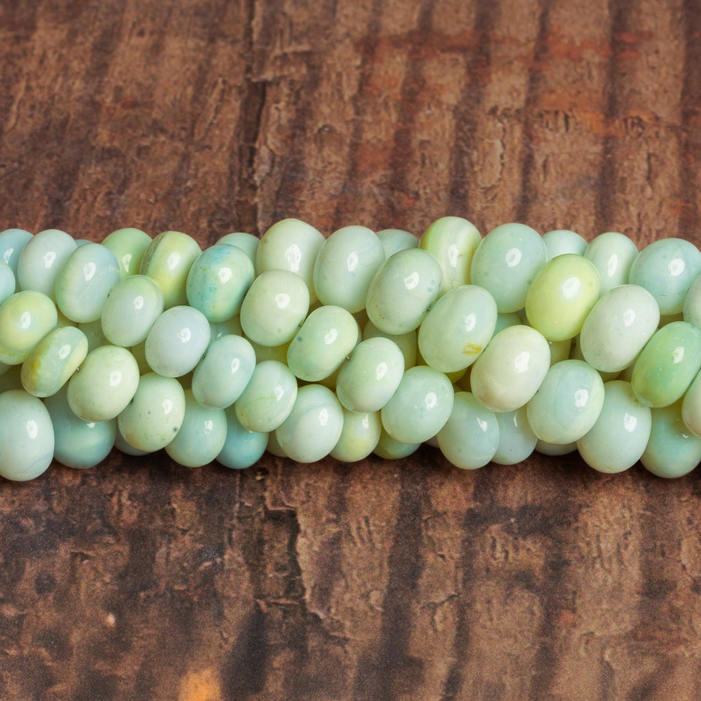 8 - 9mm Yellow Green Plain Rondelles 16 inch 67 beads - The Bead Traders