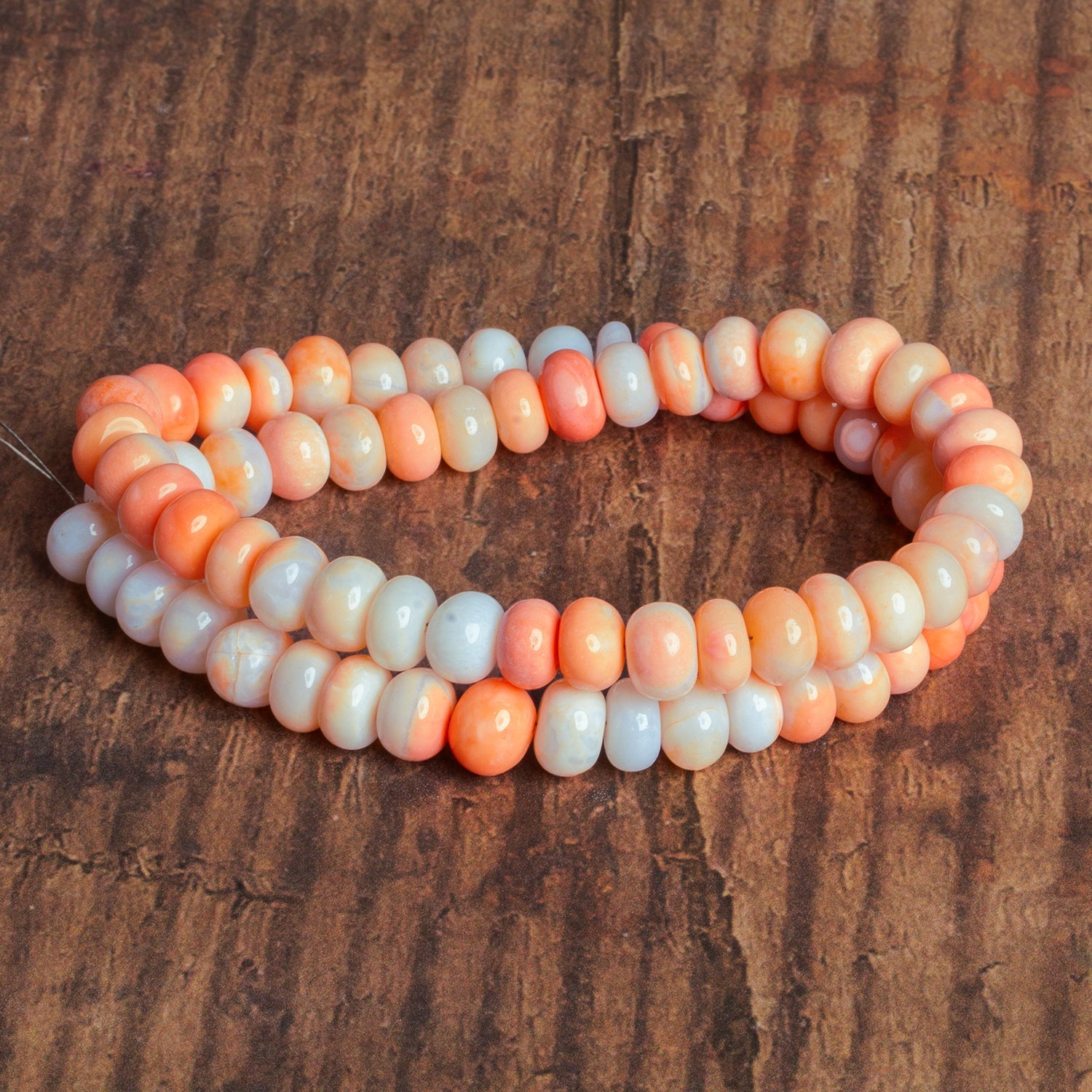 8.5mm Burning Orange Plain Rondelles 16 inch 70 beads - The Bead Traders