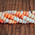 8.5mm Burning Orange Plain Rondelles 16 inch 70 beads - The Bead Traders