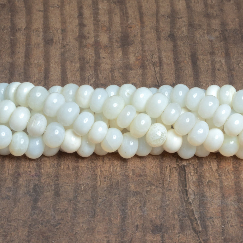 8.5mm White Opal Plain Rondelles 16 inch 70 beads - The Bead Traders