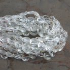 8mm Crystal Quartz Faceted Coins 7.5 inch 23 beads - The Bead Traders