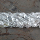 8mm Crystal Quartz Faceted Coins 7.5 inch 23 beads - The Bead Traders