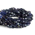 8mm Iolite Faceted Coins 7.5 inch 23 beads - The Bead Traders