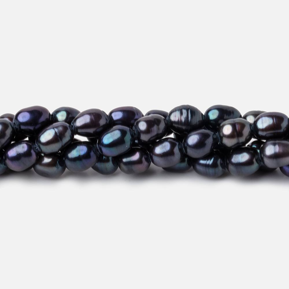 8x5mm Dark Navy Peacock Oval Pearls 15 inch 60 beads - The Bead Traders