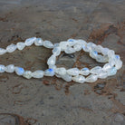 8x6mm Rainbow Moonstone Faceted Teardrops 14 inch 44 beads - The Bead Traders