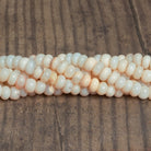 9mm Light Peach Opal Plain Rondelles 16 inch 70 beads - The Bead Traders