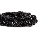 9x4mm Black Onyx Faceted Tubes 15 inch 48 beads - The Bead Traders