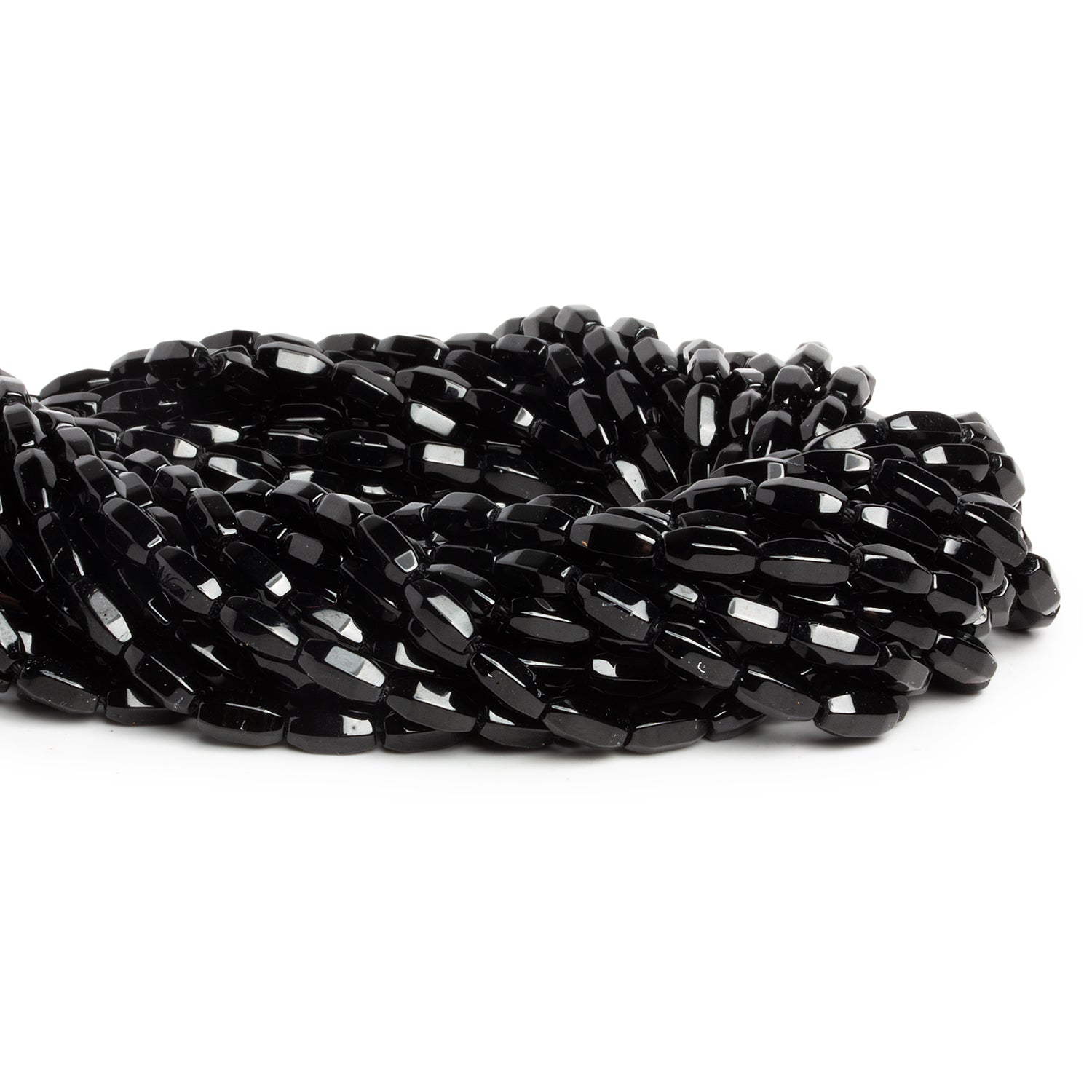 9x4mm Black Onyx Faceted Tubes 15 inch 48 beads - The Bead Traders