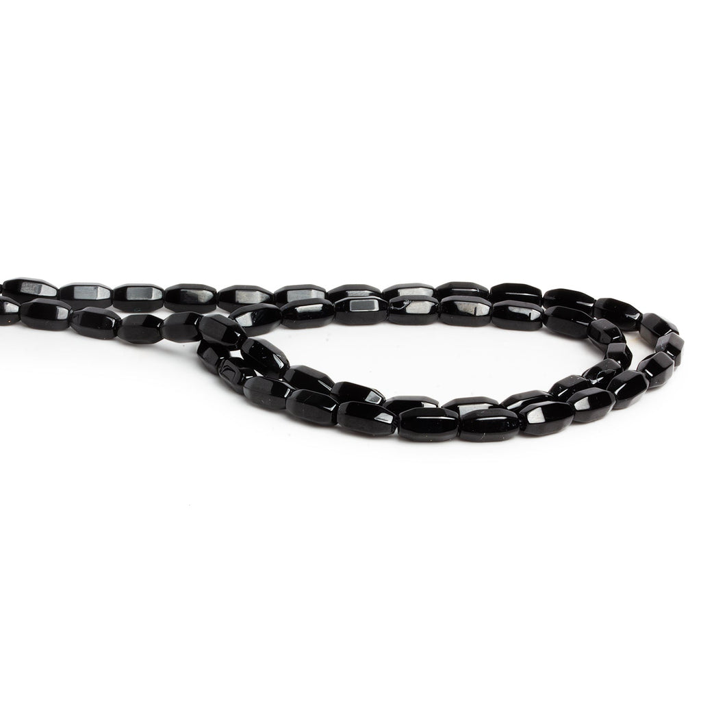 9x4mm Black Onyx Faceted Tubes 15 inch 48 beads - The Bead Traders