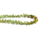9x5mm Grossular Garnet Faceted Teardrops 7 inch 55 beads - The Bead Traders