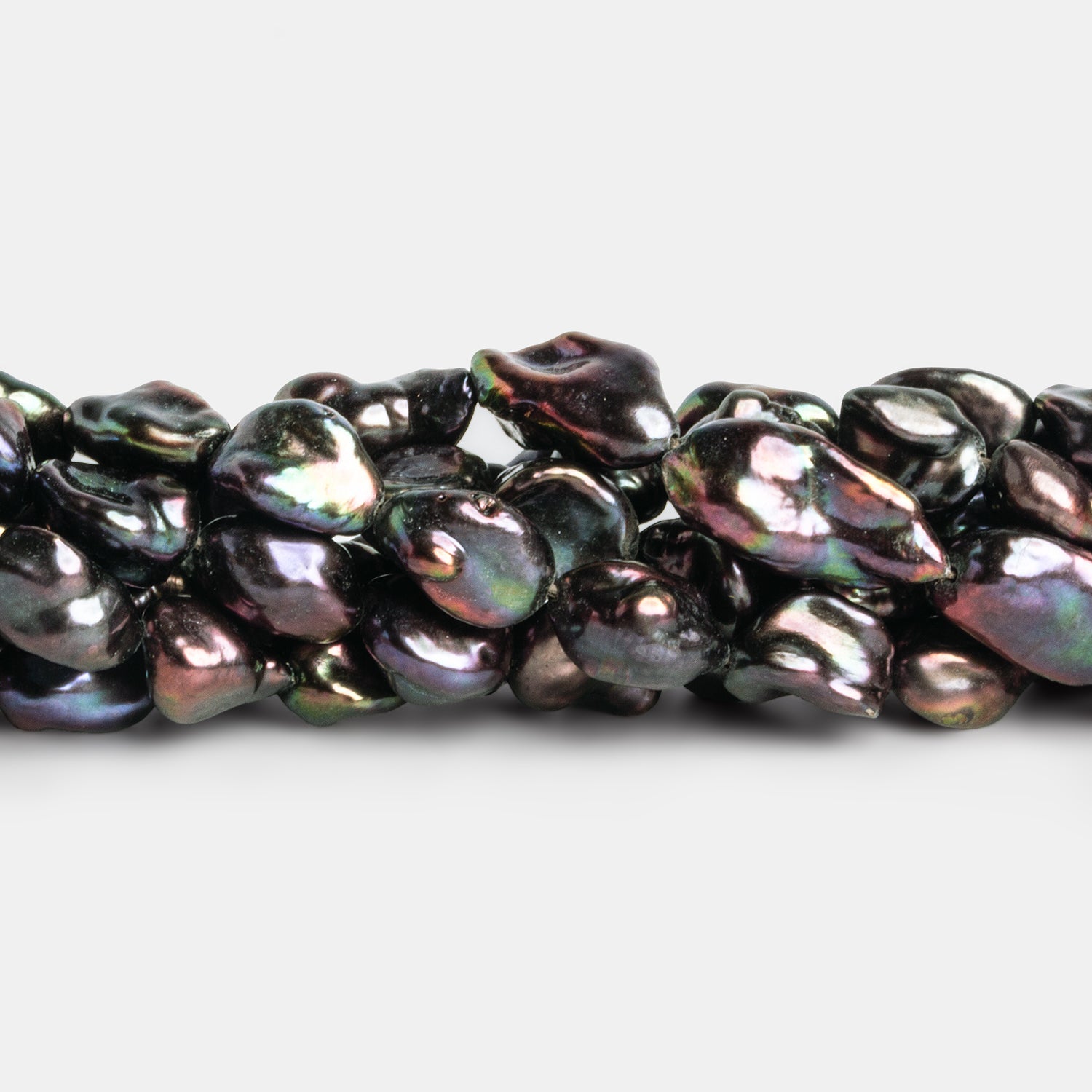9x7mm Brown Peacock Keshi Pearls 15 inch 28 beads - The Bead Traders
