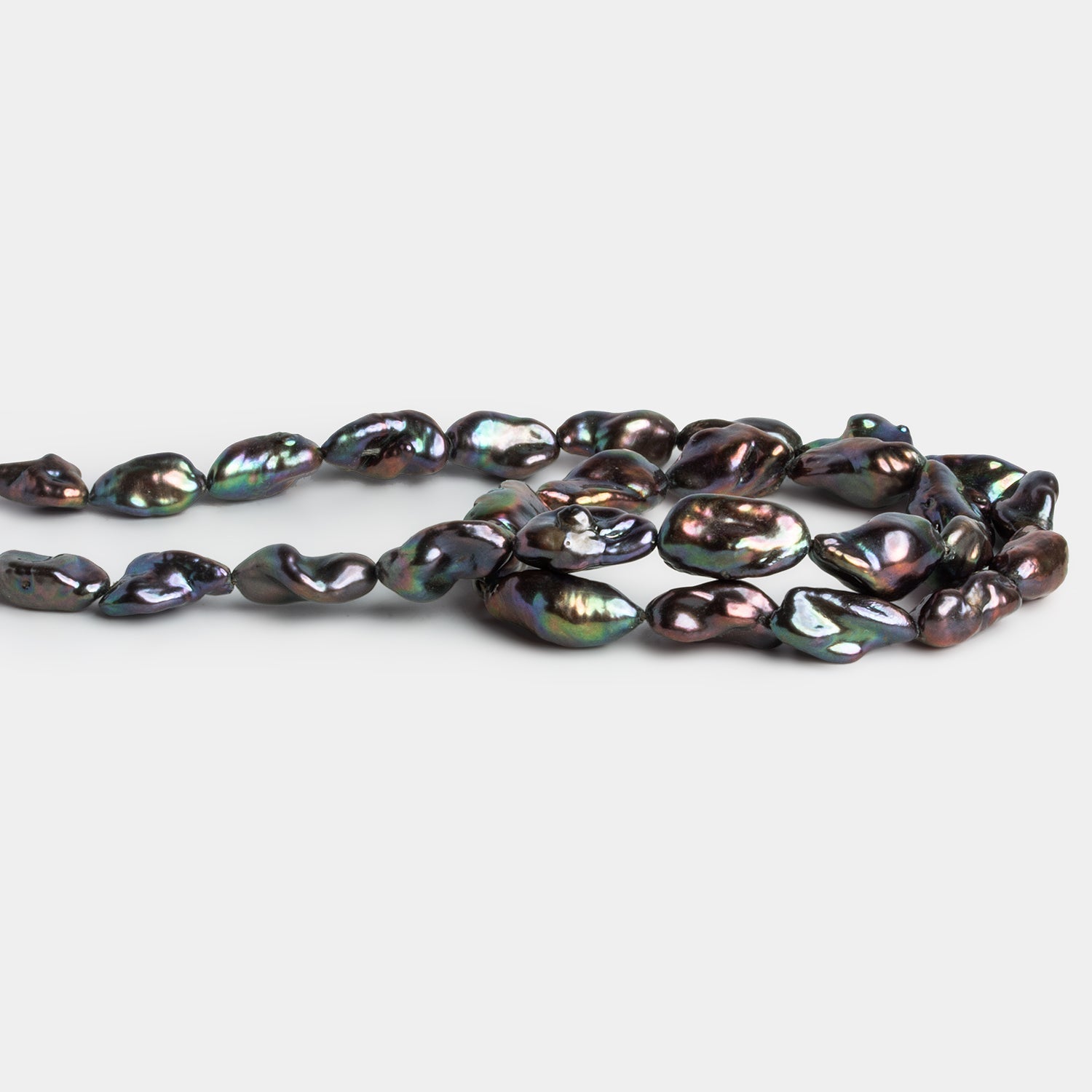 9x7mm Brown Peacock Keshi Pearls 15 inch 28 beads - The Bead Traders
