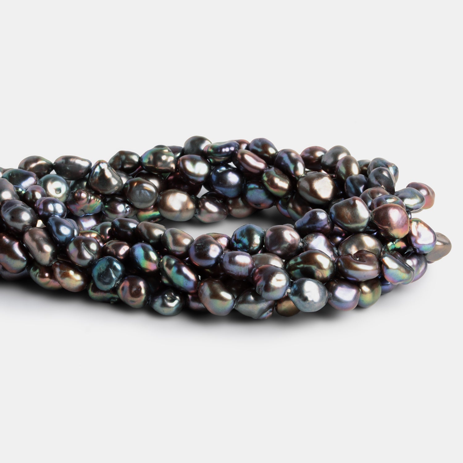 9x7mm Steel Peacock Keshi Pearls 16 inch 41 beads - The Bead Traders