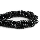 10mm Black Onyx Faceted Rondelles 15 inch 68 beads - The Bead Traders
