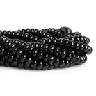 10mm Black Onyx Plain Rondelles 15 inch 65 beads - The Bead Traders