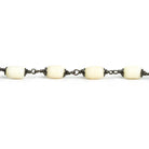 10x5mm White Ox Bone Tubes Black Gold Plated Cap and Chain by the Foot 17 pieces - The Bead Traders
