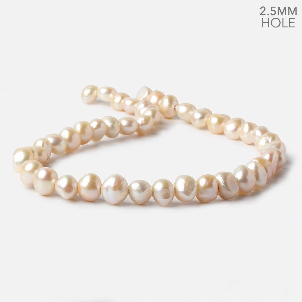 10x9-11x9mm Butter Cream Baroque Side Drilled Large Hole Pearls 15 inch 43 pieces - The Bead Traders