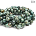 12mm African Turquoise faceted round Beads 15 inch 39 pieces - The Bead Traders
