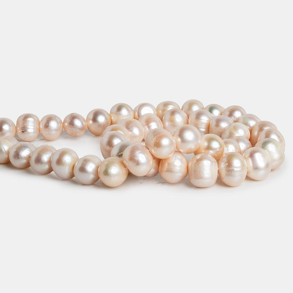 12x10mm Peach Baroque Pearls 15 inch 40 beads - The Bead Traders