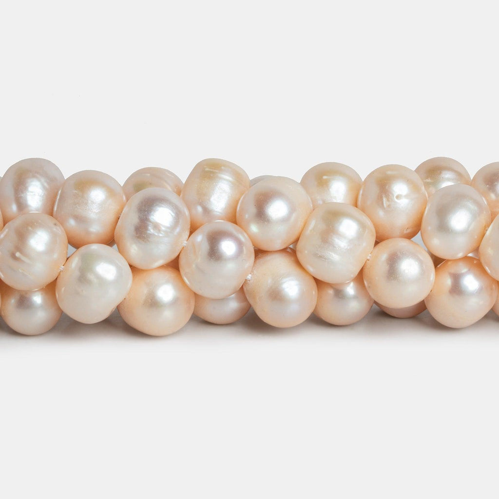 12x10mm Peach Baroque Pearls 15 inch 40 beads - The Bead Traders