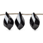 12x9.5-16x8mm Black Spinel Barrel Faceted Twists 7.5 inch 15 beads - The Bead Traders