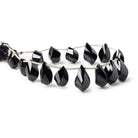 12x9.5-16x8mm Black Spinel Barrel Faceted Twists 7.5 inch 15 beads - The Bead Traders