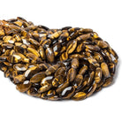 17x10mm Tiger's Eye faceted oval beads 15 inch 22 pieces - The Bead Traders
